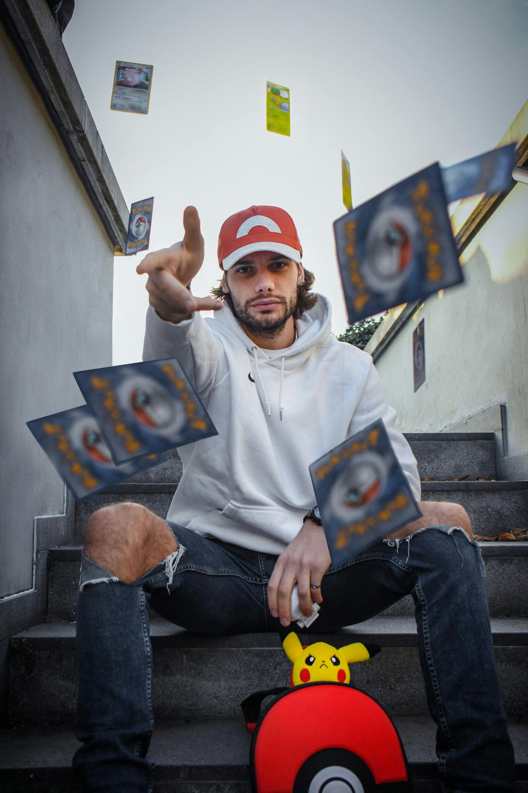  trainer throwing Japanese Pokémon Cards and Pikachu bag TCG |JAYS POKE HUB.